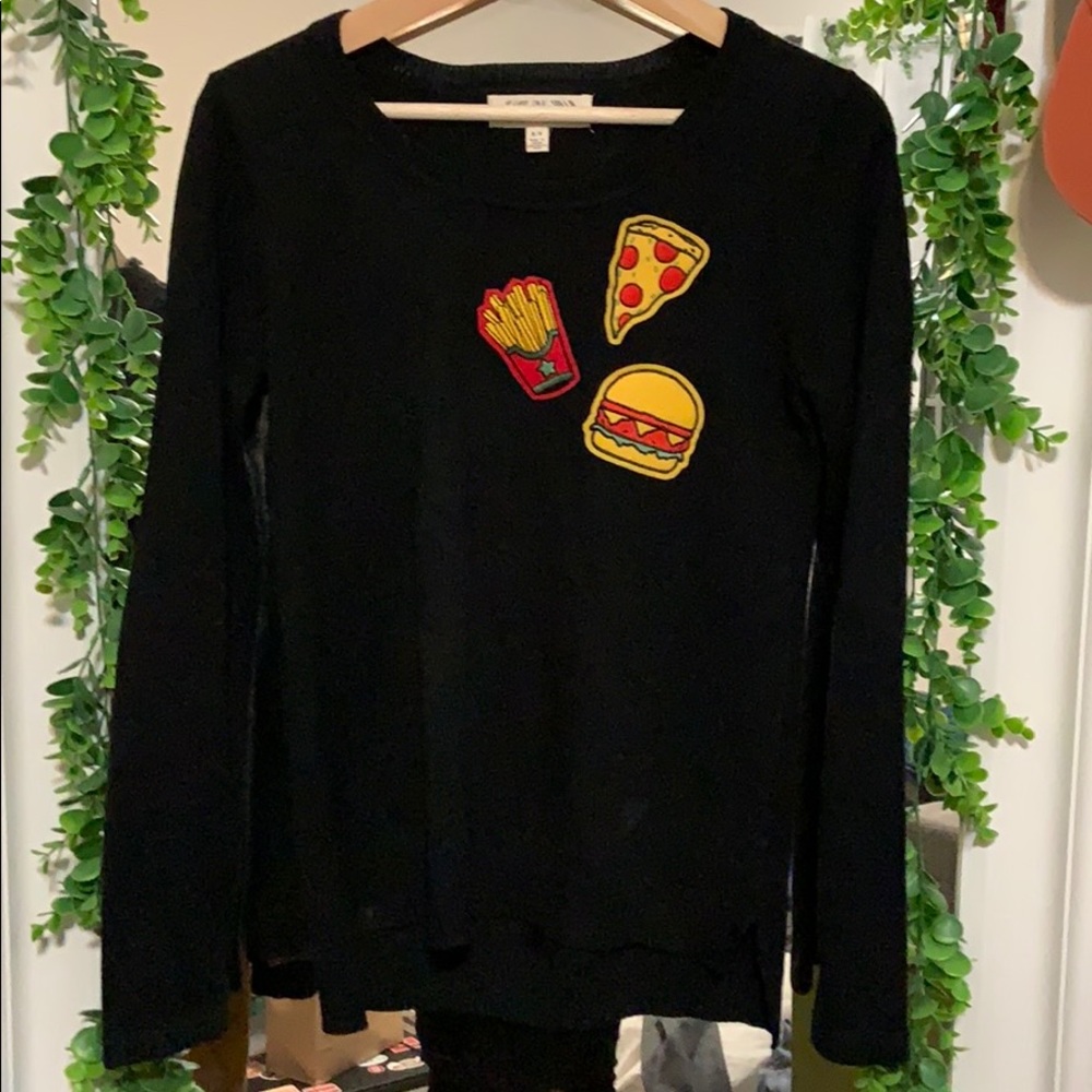Black long sleeve sweater with fast food patches